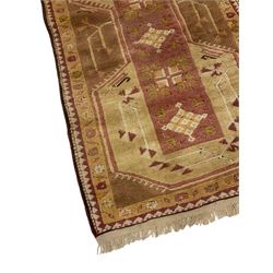 Turkish pale peach ground rug, overall geometric design (142cm x 85cm); and a Persian design blue and pink ground rug, overall floral design (190cm x 125cm)