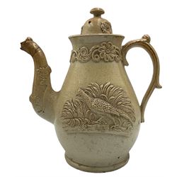 19th century Brampton salt glaze stoneware teapot, with moulded and applied decoration of a Pheasant and Hare H23cm, 19th century salt glaze tobacco jar with matched cover, S. & H. Briddon, Brampton brown salt glazed stoneware fluted bachelors teapot and cover, together with a treacle glaze sash window rest in the form of a Lions Head (4)