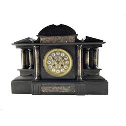 French - late 19th century Belgium slate 8-day mantle clock, with an architectural pediment and break front case, recessed contrasting marble pillars on a broad conforming pediment, dial with cartouche Arabic numerals and steel spade hands, rack striking Mougin movement , striking the hours and half hours on a coiled gong. With pendulum.