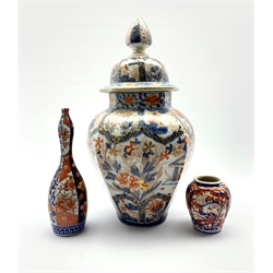 Japanese Imari pattern vase and cover of panel sided design decorated in orange blue and gilt H43cm  and two other Imari vases 