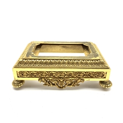  19th/ early 20th century Ormolu rectangular clock stand, cast in relief with scrolling foliage, L30cm x D22cm   