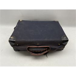 An early 20th century French leather travelling fitted vanity case, retailed A. Hardy 78. Rue de Turenne. Paris, with canvas protective cover L48cm 