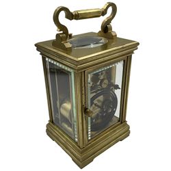 Late 19th century French  8-day striking carriage clock with a rack strike repeat on a gong - in an anglaise brass case with an oval escapement viewing glass and  bow shaped carrying handle to the top of the case, enamel dial with Roman numerals, minute markers and steel spade hands, two train going barrel movement with a replacement platform lever escapement and original matching leather carrying case with strap. Original double key.