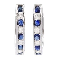 Pair of white gold channel set sapphire and diamond hoop earrings, stamped 14K