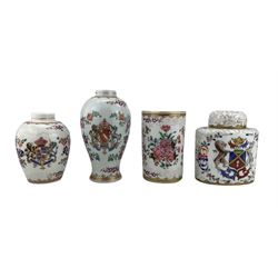 Three peices of 19th century porcelain, possibly Samson of Paris, including a tall mug tankard, decorated with floral sprays and bianco-sopra-bianco enamel, H12cm, and two similarly decorated small armorial vases, together with a 20th century Limoges tea caddy (4)