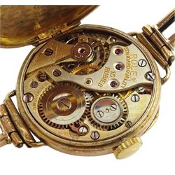 Rolex 9ct gold ladies manual wind wristwatch case No. 3592, the inside back case with personal inscription, the outer back case monogramed with initials, Glasgow import marks 1923, retailed by Owen & Robinson Ltd, Leeds, on gold expanding bracelet, stamped 9ct 