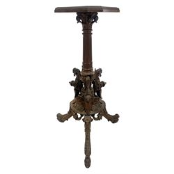 19th century walnut tripod stand, concave and canted square top with lobe carved rim, fluted column with scrolling acanthus leaf capital on platform, the platform of circular form carved with shells and surmounted by three dragon figures, three splayed scaled supports carved with acanthus leaves and with ball and claw feet, foliate swags and carved stylised flower head brackets