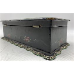 Victorian papier-mâché serpentine sewing box, the hinged cover with rectangular coloured and foiled print on glass depicting Buckingham Palace, within a gilt and polychrome decorated border and partly fitted interior, L27cm x H12cm. Provenance: with a hand written letter detailing part of the boxes history, dated 1952