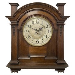 Large and imposing wall mounted clock in an oak case with a single train fusee movement, case mounted on an integral recessed corbel bracket with a break arch deep moulded pediment and corresponding moulding to the front of the case, with glazed side doors and inner dial bezel lock, 14” two-part silvered dial with Arabic numerals, minute track and inner quarter-hour track, pierced steel hands within a cast brass bezel and flat bevelled glass, dial inscribed “William Crow, Stratford, A.D.1899” with a well finished 19th century eight-day fusee movement with plain pillars, fusee chain and fusee stop work. With pendulum.
William Crow is recorded as working in the late 19th century as a clock retailer, watchmaker, optician and Jeweller from various London premises including 140 The Grove and 29 West Ham Lane, Stratford, London. Given the size of the case and construction it is possible the clock was commissioned and constructed for use in a large institutional or public building.  


