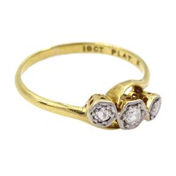 Early 20th century three stone old cut diamond crossover ring, stamped 18ct Plat