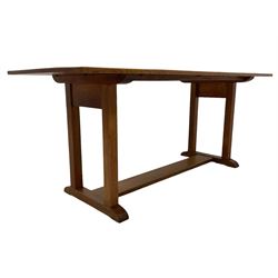 Gordon Russell - circa. 1930s oak refectory dining table, rectangular top over square supports united by trestle base