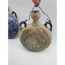 Pair of Moorish pottery flasks decorated in blue and white D18cm and a Continental blue and white mug H14cm