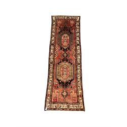Persian runner rug of geometric design and ivory border 