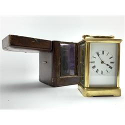  Late 19th century four glass brass carriage clock, white enamel dial with Roman numeral chapter ring, eight day striking movement, in leather travelling case, H16cm  