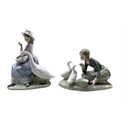 Two Lladro figures 'Food for the Ducks' model no. 4849 and 'Goose Trying to East' model no. 5034, both boxed (2)