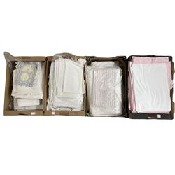 Four boxes of bed and table linen, damask serviettes etc