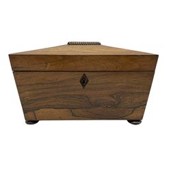 Regency rosewood sarcophagus shape tea caddy, the interior with two lidded compartments and on compressed bun feet L23cm 
