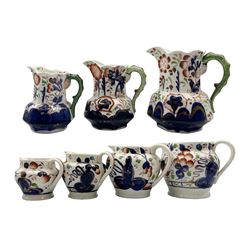 Set of three graduated Allertons jugs, with dragon moulded handles, together with four graduated Gaudy type jugs, H16cm max (7)