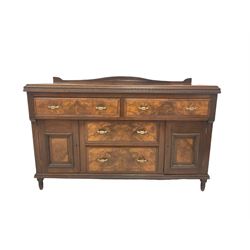 Early 20th century figured walnut sideboard, the raised back over the rectangular top with carved and moulded edge, fitted with two long and two short drawers flanked by two cupboards, raised on turned supports W150cm, H99cm, D50cm