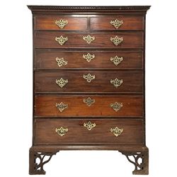 George III mahogany straight-front secretaire chest, dentilled cornice over two short and five long drawers with pierced brass handle plates and escutcheons, the third fall-front drawer enclosing fitted interior with pigeonholes and drawers, raised on pierced bracket feet