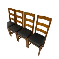 Set four of oak dining chairs with upholstered seat pads, raised on square tapering supports, united by H stretcher