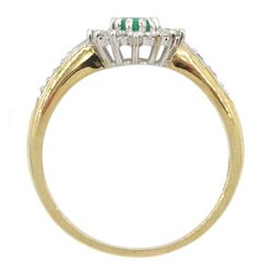 9ct gold oval emerald and round brilliant cut diamond cluster ring, with diamond set shoulders, hallmarked
