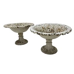 Pair white painted cast iron bowl shaped garden urns, moulded bowl on globular stem and circular moulded foot