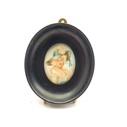 Miniature oval head and shoulders portrait of a fashionable lady in a large hat and in ebonised frame 7cm x 5cm