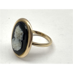 Gold black onyx cameo ring, stamped 9ct