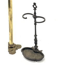 20th century brass standard lamp, with leaf moulded capitol and base, (H136cm) together with a Victorian cast iron stick stand, 
