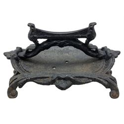 Victorian cast iron boot scraper, in the form of a large cartouche with scrolling acanthus leaf feet, H16cm