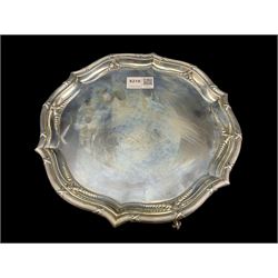 Silver circular salver, the moulded edge with harebells and on scroll feet D25cm London 1908 Maker Goldsmiths and Silversmiths Co. 14.9oz