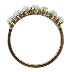 Silver-gilt seven stone opal ring, stamped Sil