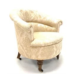 Victorian tub upholstered armchair, upholstered in ivory floral damask fabric, raised on turned walnut supports terminating in brass and ceramic castors W70cm