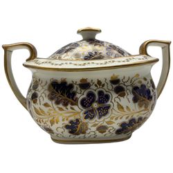 Late 18th century New Hall porcelain, decorated with acorns in cobalt blue and gilt - pattern number 562, comprising sucrier and four coffee cans