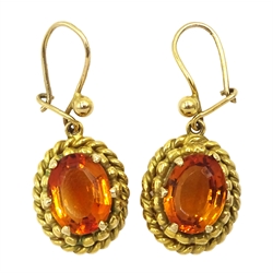 Pair of 10ct gold oval citrine double rope twist design pendant earrings 