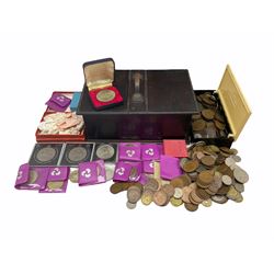 Coins including a Canadian 1963 silver dollar, various Great British commemorative crowns, pre-decimal pennies, World coins including France, United States of America etc