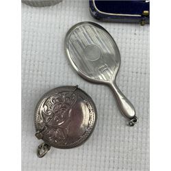 Edwardian circular silver vesta by Charles Lyster & Son, Birmingham 1907, Victorian silver cricket fob medal by S. Bros, Birmingham 1892 in matched box, together with a pair of cut glass dressing table jards with silver lids, engraved with the Case family crest, approx 2.06 ozt and a small miniature silver backed hand mirror 