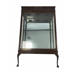 Early 20th century mahogany museum cabinet, the mirrored interior enclosed by a large single glazed door, wall mounted and raised on two front cabriole supports with ball and claw feet