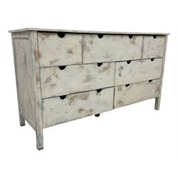 Distressed white and blue painted pine chest, fitted with seven drawers