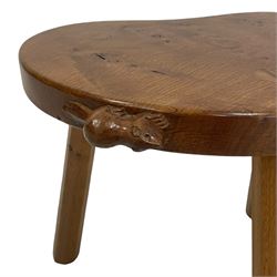 'Beaverman' oak three-legged stool, figured kidney shaped top carved with beaver signature, three tapered and splayed octagonal supports, by Colin Almack of Sutton-under-Whitestonecliffe