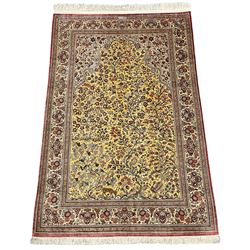 Fine silk Persian Qum tree of life rug, arched field with trailing tree branch decorated with animal and bird motifs, overall floral decoration, the guarded border with with repeating flower head design, signature panel to top