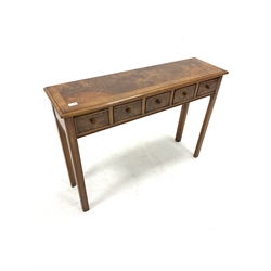 20th century walnut side table, well figured cross banded top with herringbone inlay over five drawers, raised on square chamfered supports, W107cm, 