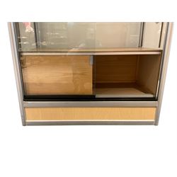 Tall display cabinet, fitted with two glazed sliding doors with glazed sides and back, interior light fittings, with adjustable glass shelves
