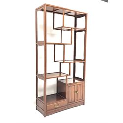 Chinese hardwood curio stand, fitted with four staggered shelves, double cupboard and drawer. W92cm, H182cm, D36cm