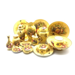 A collection of Aynsley Orchard Gold and similar ceramics including vases, bowls, milk jug, trinket box and other pieces