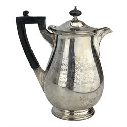 Silver hot water jug of baluster form with ebonised handle and lift, presented to 'Professor G.L.Roberts from Dental staff at Sheffield Royal Hospital' Sheffield 1938 MakerJames Dixon & Sons 