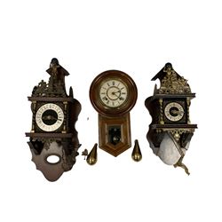 Three contemporary wall clocks