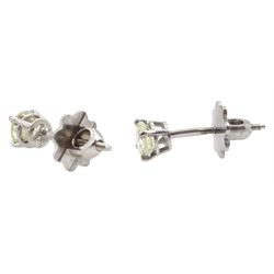 Pair of 18ct white gold round brilliant cut diamond screw back stud earrings, hallmarked, total diamond weight approx 1.00 carat