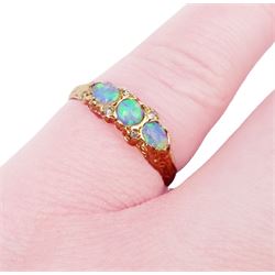 9ct gold three stone opal ring, with diamond accents set between, hallmarked